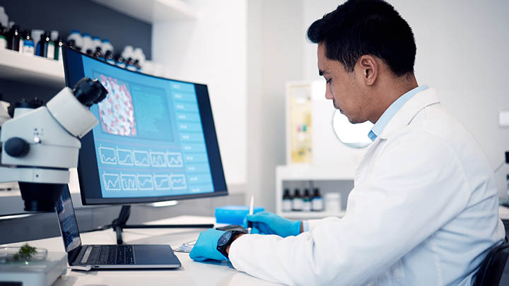 A researcher analysing data.